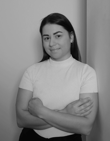 Black-and-white professional portrait of Penny Rutter, Project Coordinator at Trendsetter Homes.