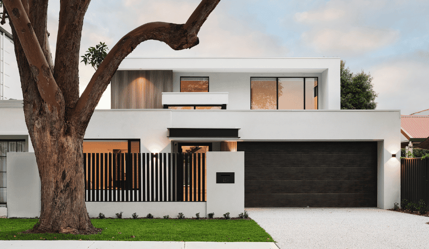 Exterior of a contemporary Ardross custom home featuring contrasting materials, large windows and modern architectural detailing.