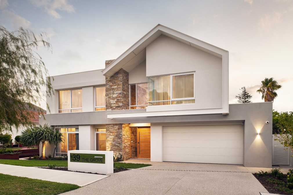 Architectural render of a two-storey custom home featuring pitched rooflines, stone cladding and a landscaped frontage.